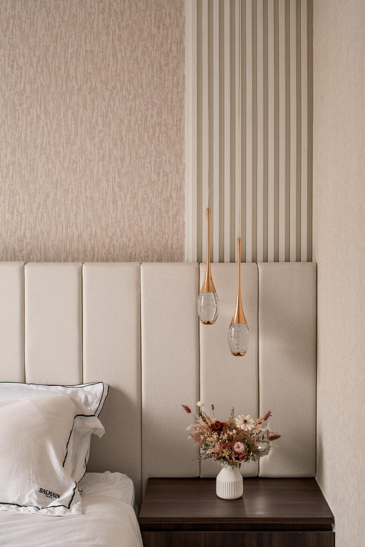 Contemporary Bedroom with Chandelier and Bedside Table