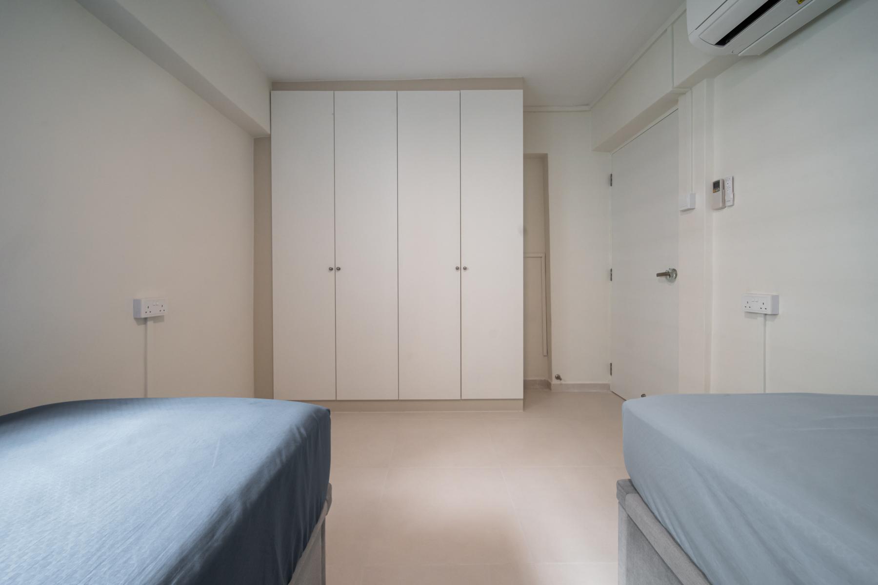Scandinavian Bedroom with Homogeneous Tiles and Wood Flooring