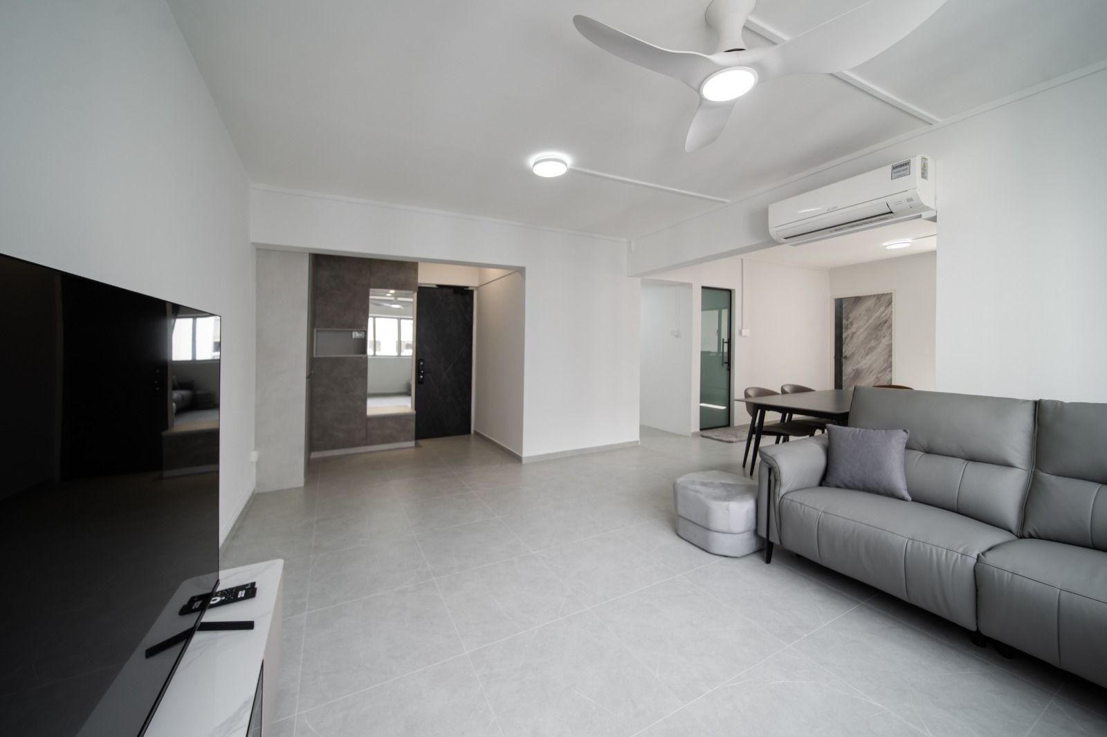 Modern Living Room with Homogeneous Tiles and Sofa