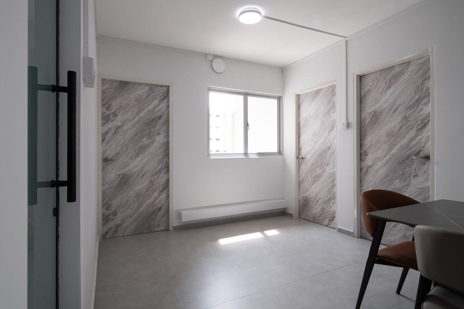 Modern Living Room with Homogeneous Tiles and Chandelier