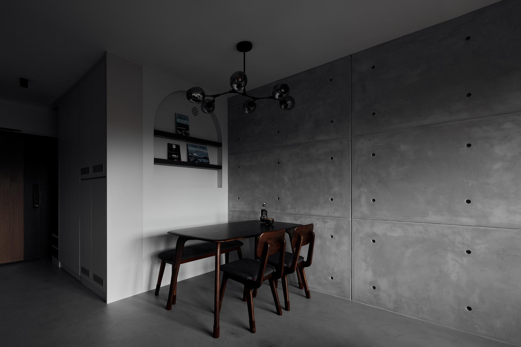 Industrial Living Room with Cement Floor and Ceiling Light