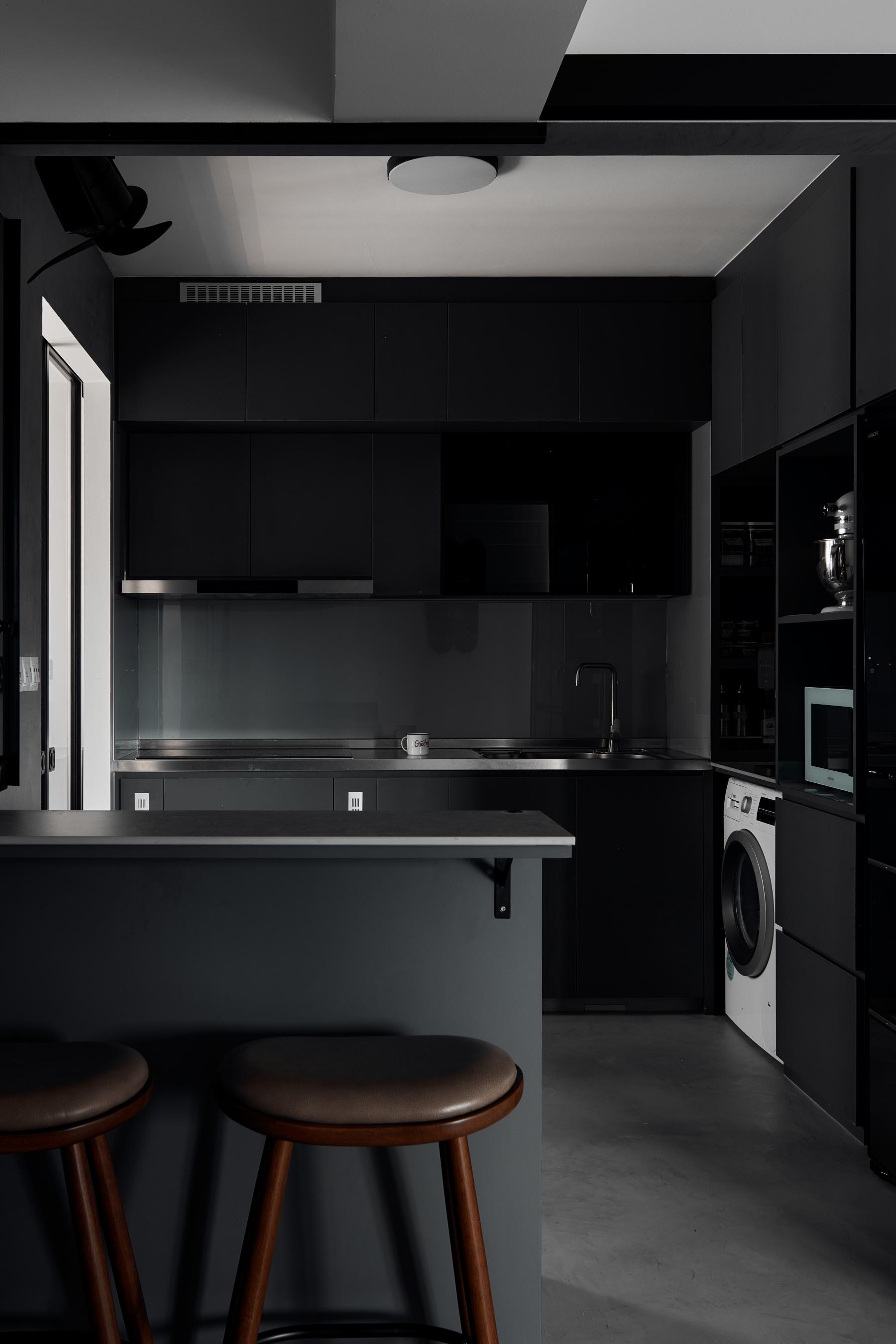 Industrial Kitchen with Countertop and Washing Machine