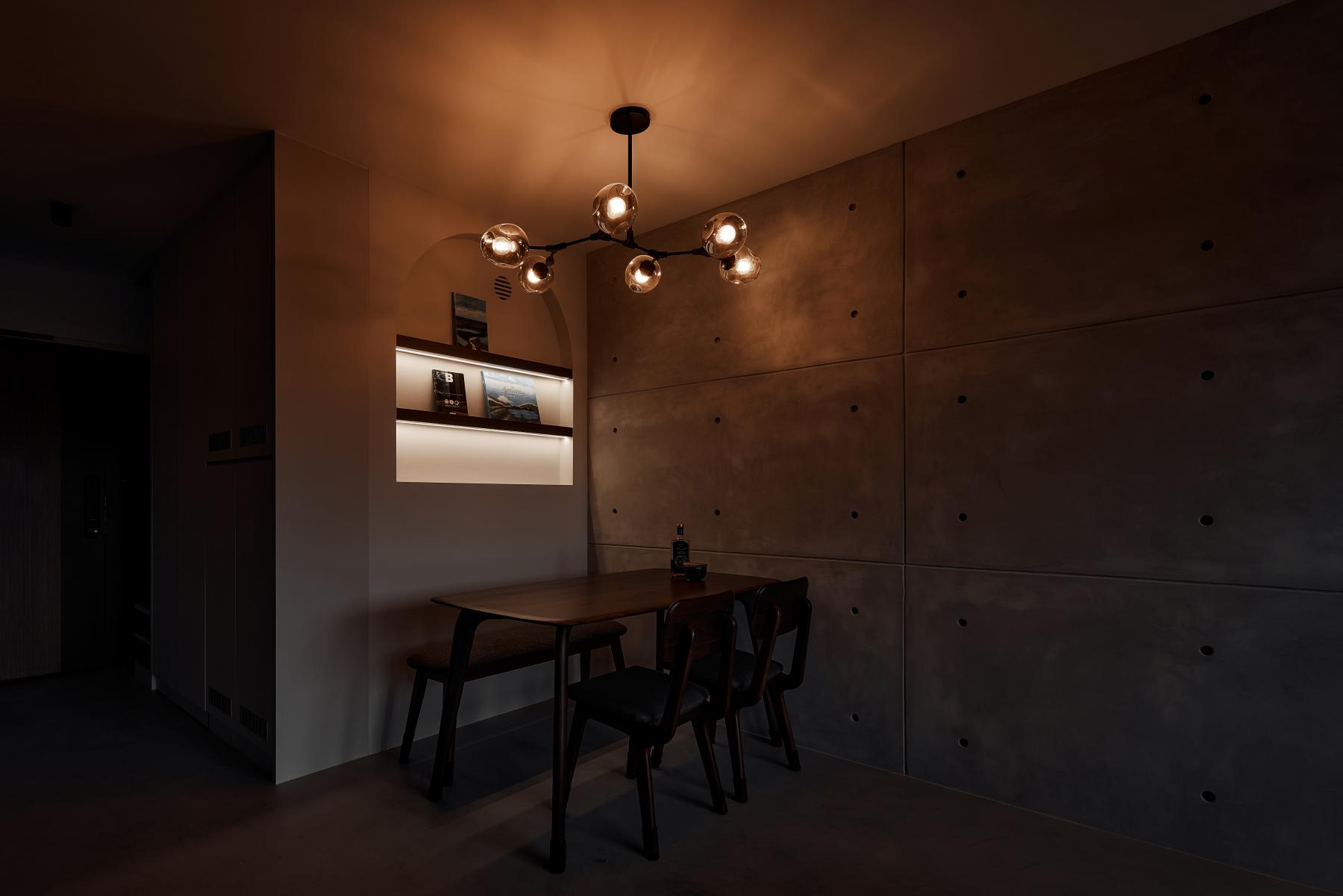 Industrial Living Room with Bookshelf and Ceiling Light