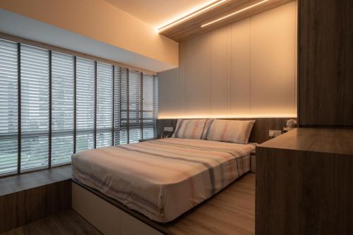 Modern Bedroom at Waterfront Waves