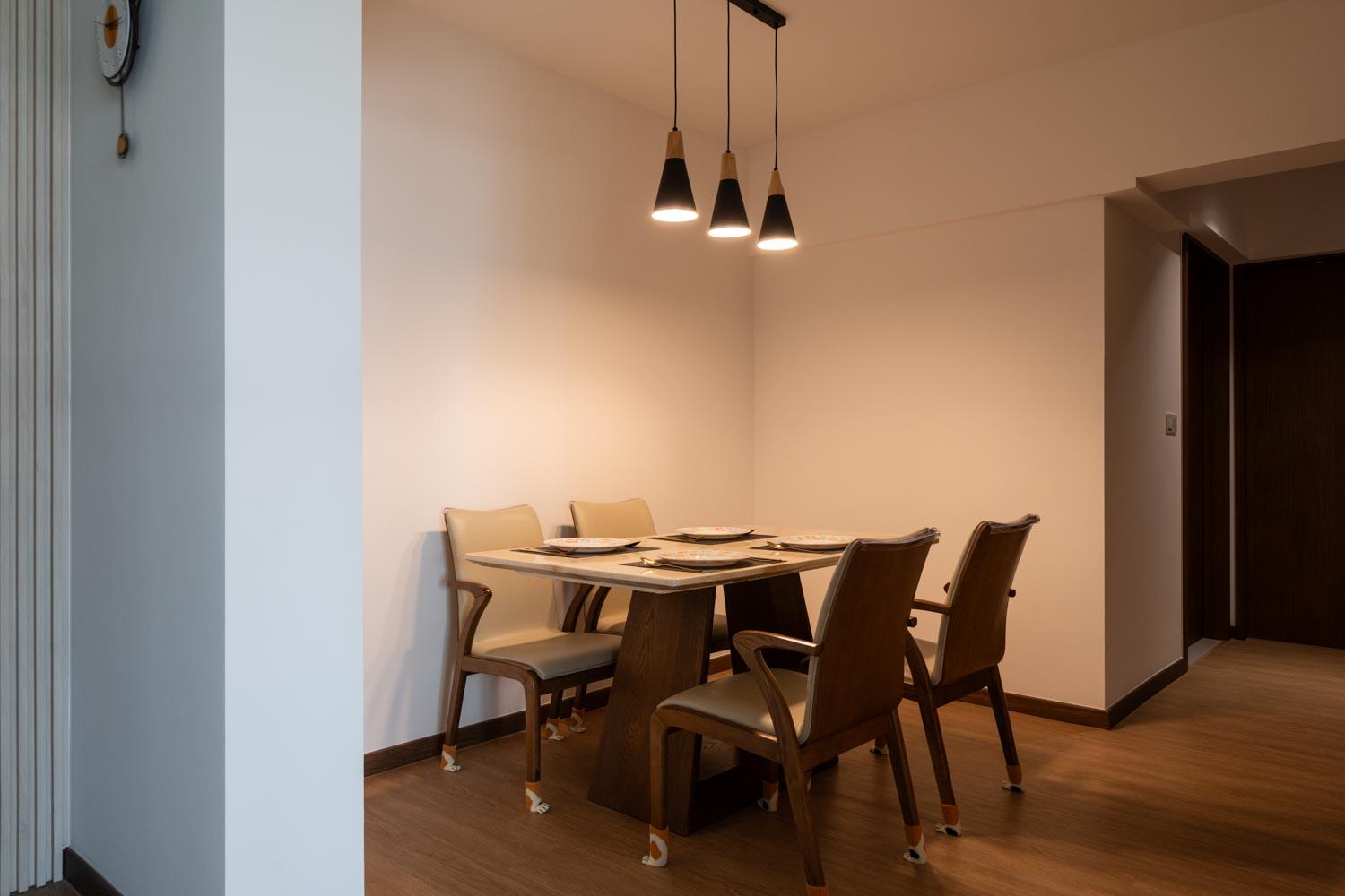 Minimalist Dining Room with Ceiling Light and Dining Table