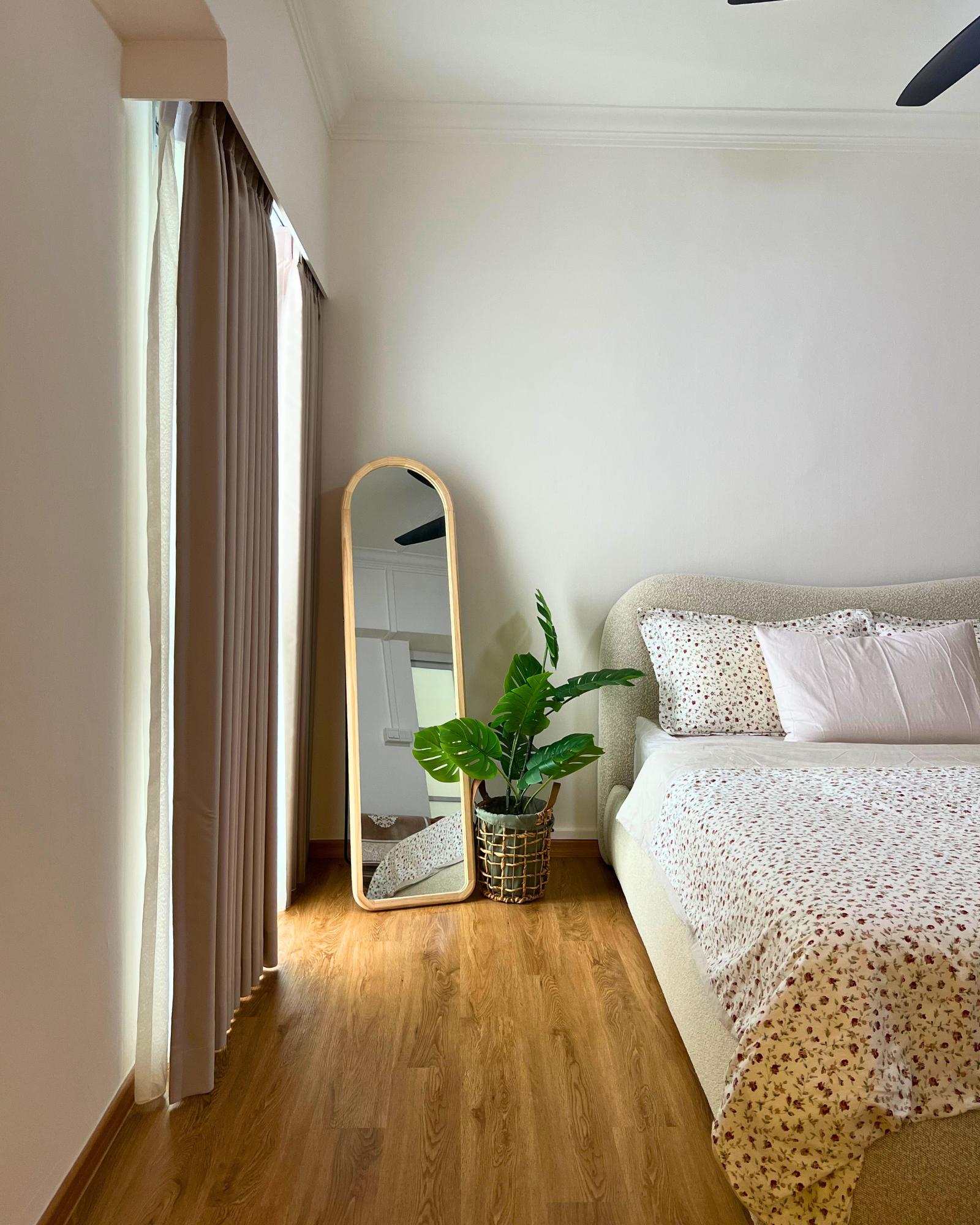 Scandinavian Bedroom with Wood Flooring and Drop Light