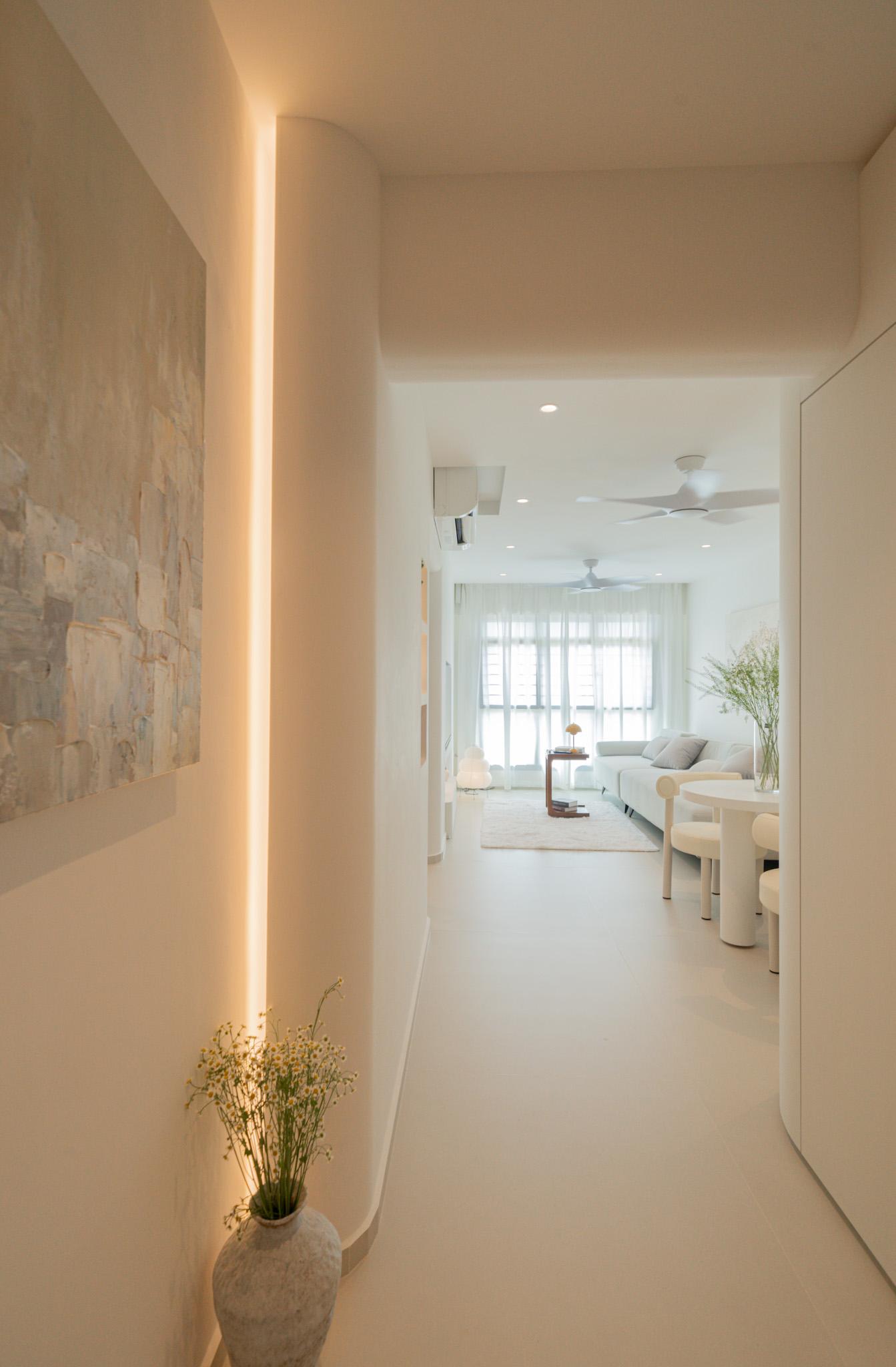 Minimalist Entryway with Shoe Cabinets and Lighting