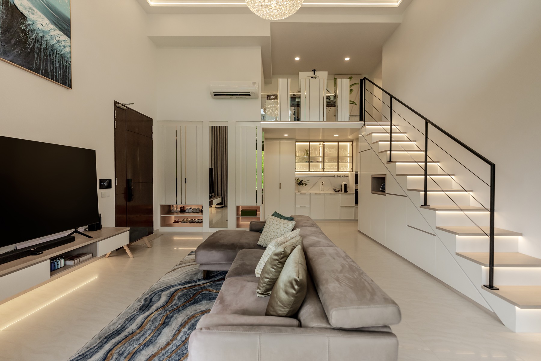 Contemporary Living Room with TV Console and Staircase