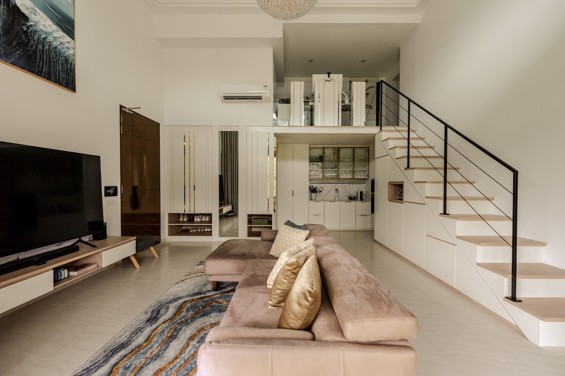 Contemporary Living Room with TV Console and Staircase