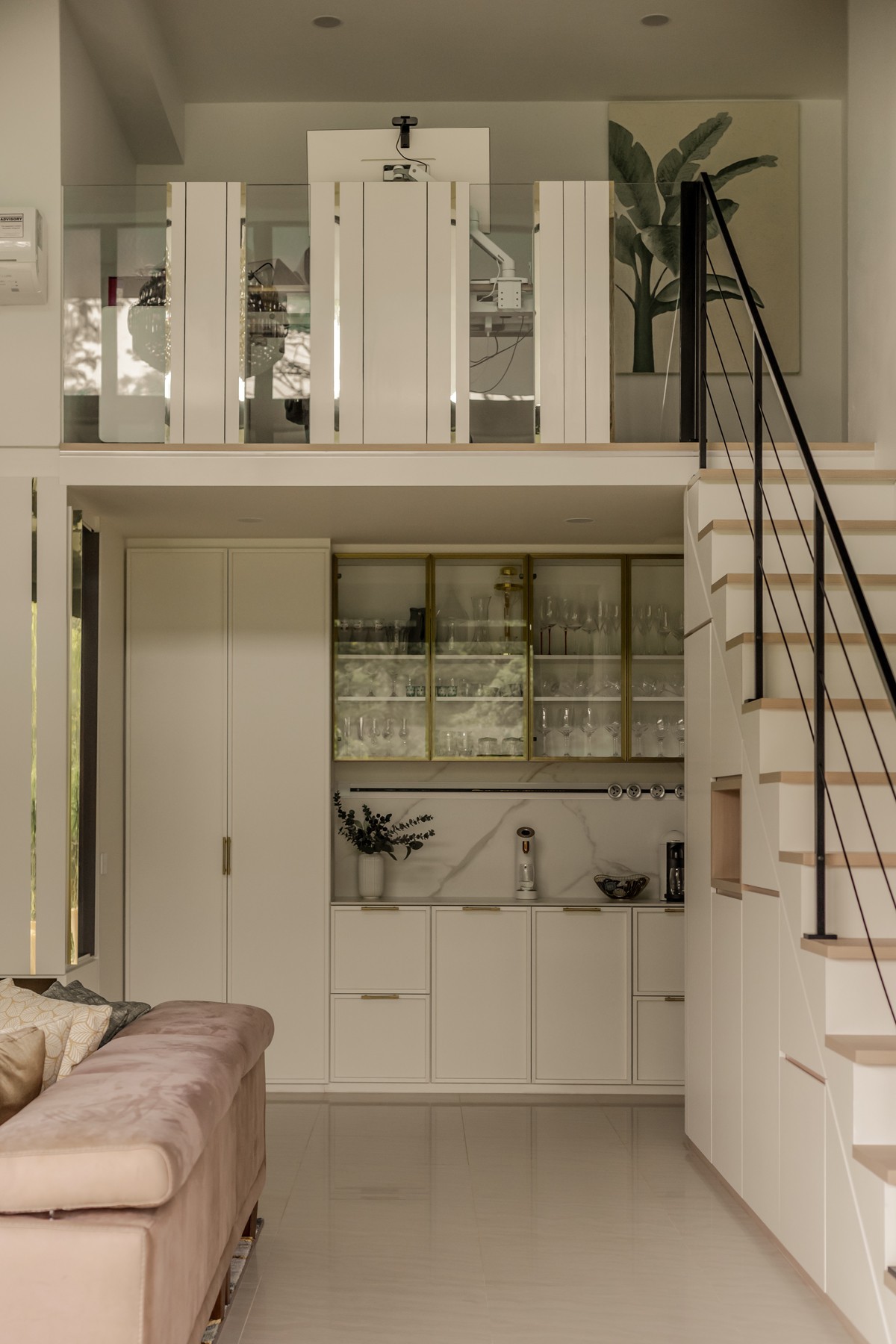 Contemporary Living Room with Feature Wall and Staircase
