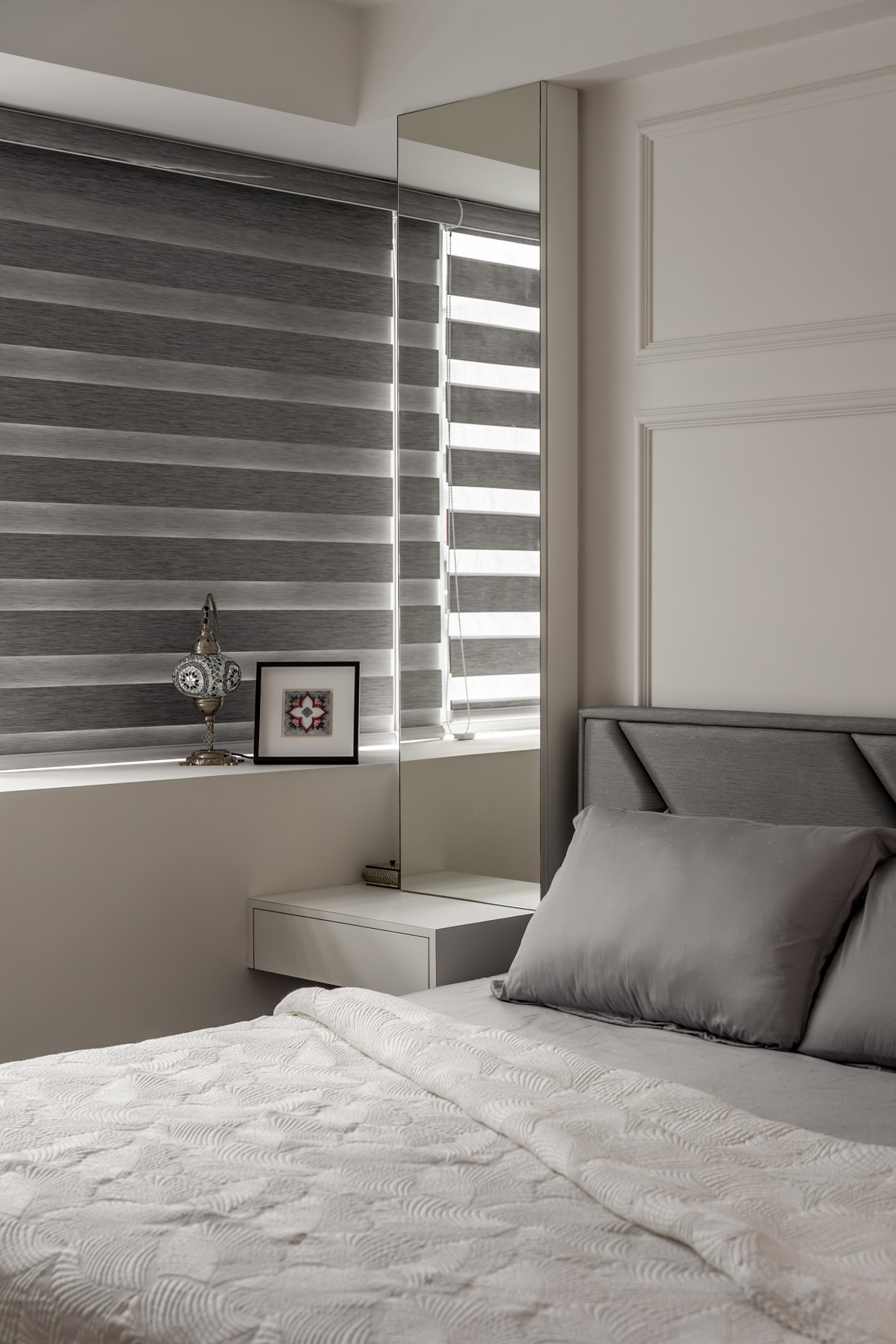 Modern Bedroom with Feature Wall and Mirror