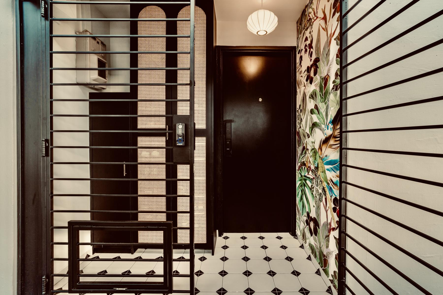 Vintage Foyer with Artwork and Planters