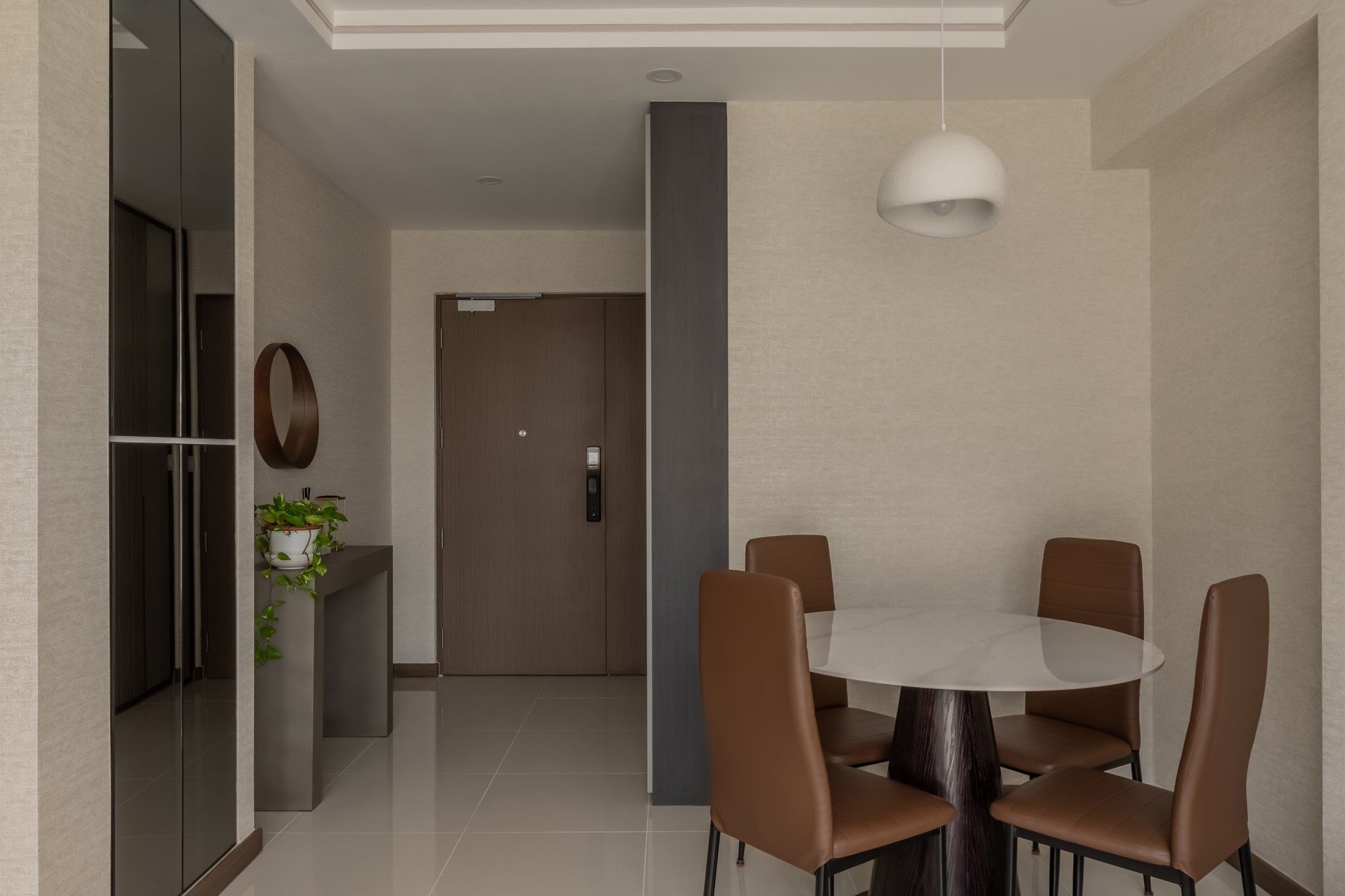 Contemporary Dining Room with Feature Wall and Mirror
