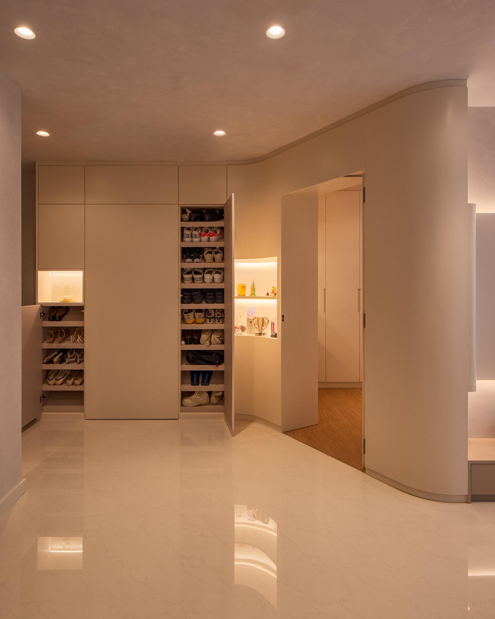 Minimalist Foyer with Shoe Cabinets and Lighting