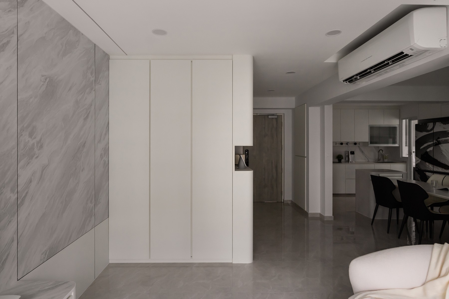 Minimalist Living Room with Feature Wall and Storage Cabinets