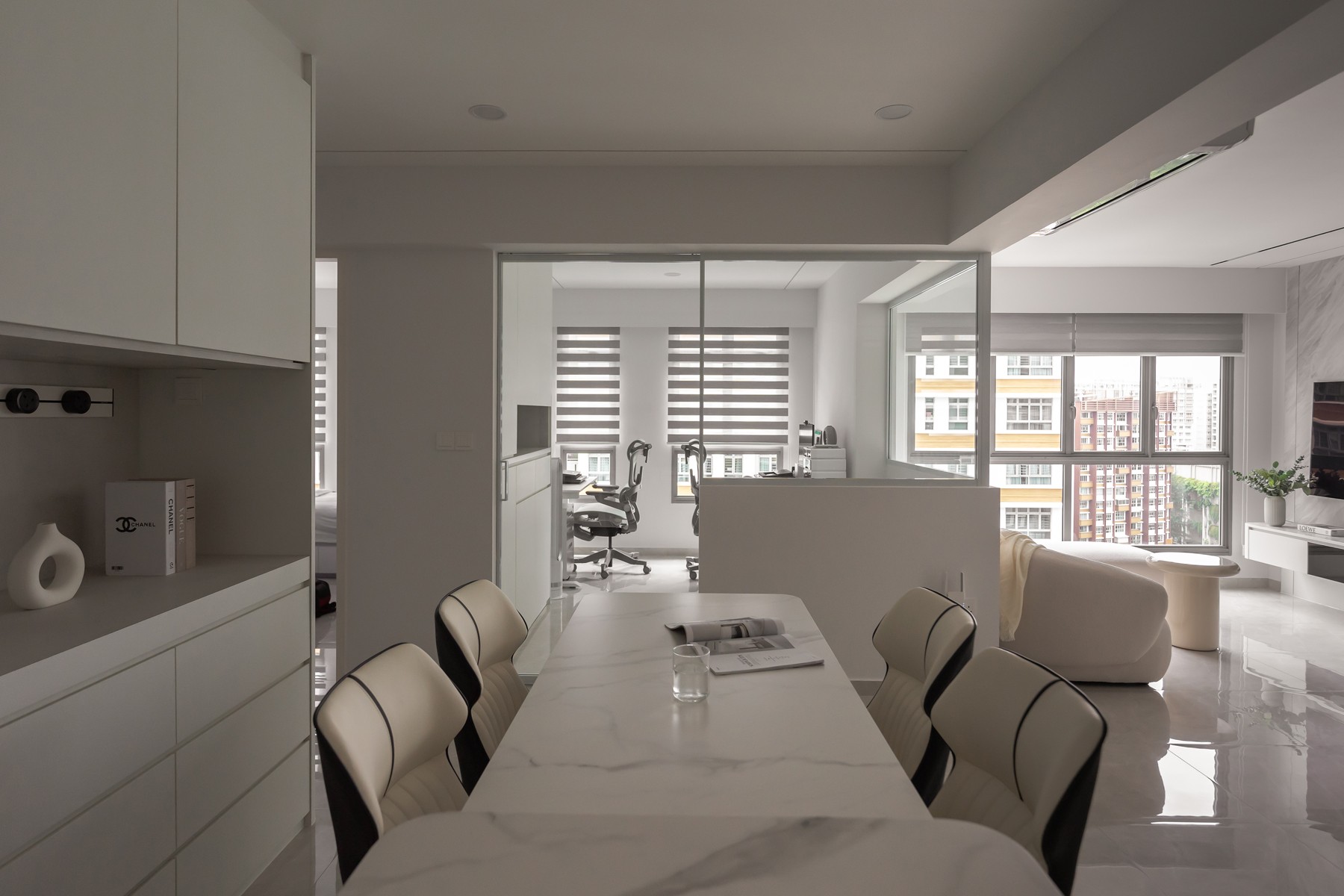 Minimalist Dining Room with Kitchen Island and Glass Door