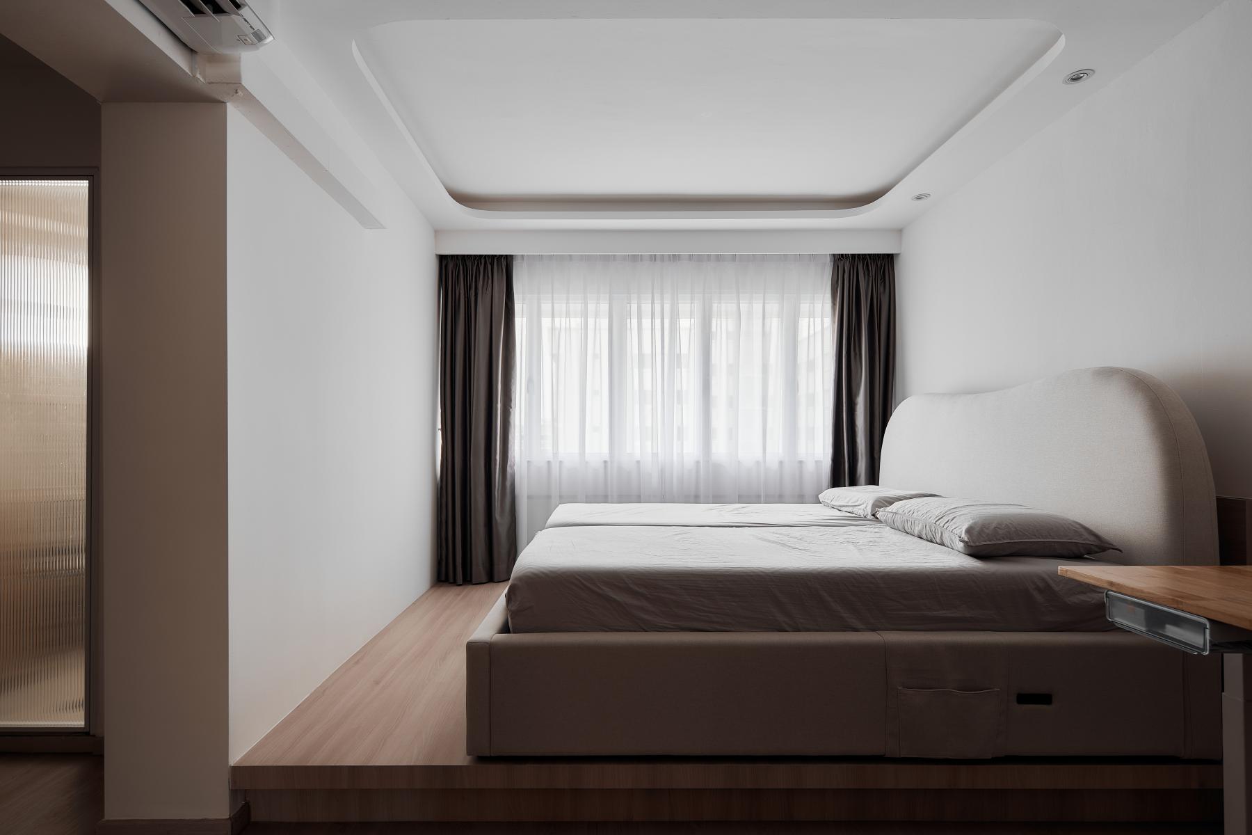 Scandinavian Bedroom with Platform Bed and Ceiling Light