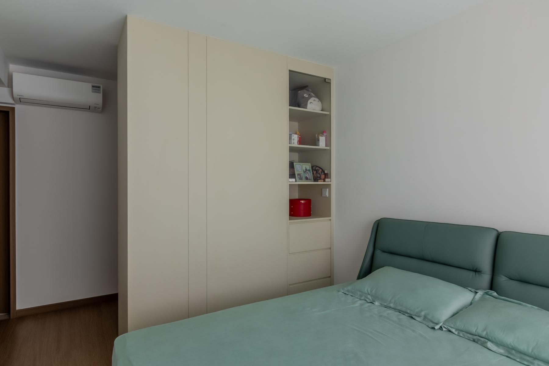 Minimalist Bedroom with Bookshelf and Wood Flooring