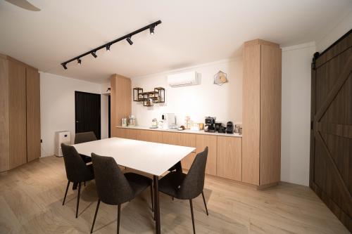 Transitional Dining Room at The Rojak Home