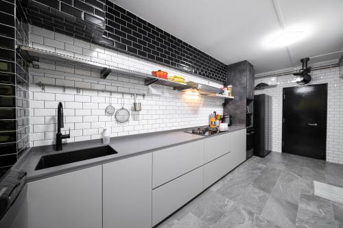 Transitional Kitchen at The Rojak Home