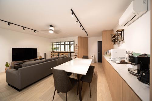 Transitional Dining Room at The Rojak Home