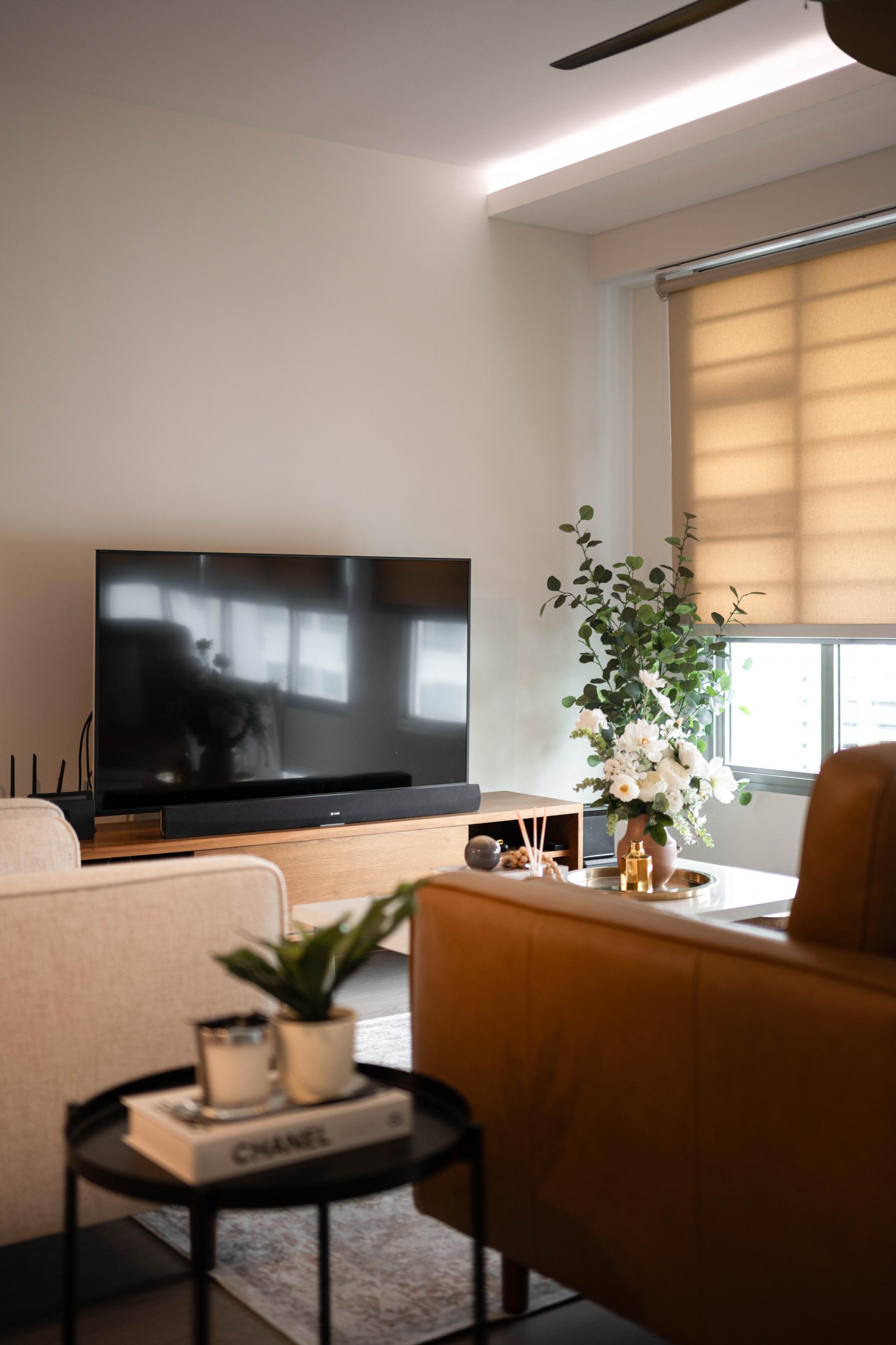 Contemporary Living Room with TV Console and Cove Lighting