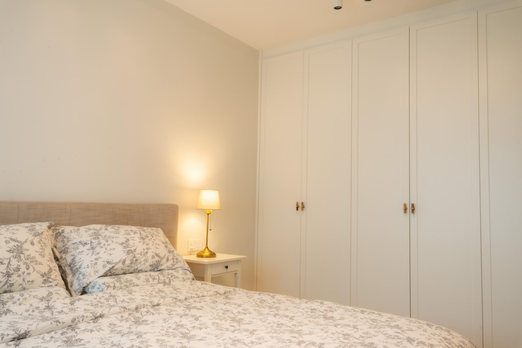 Minimalist Bedroom with Vinyl Flooring and Wardrobe