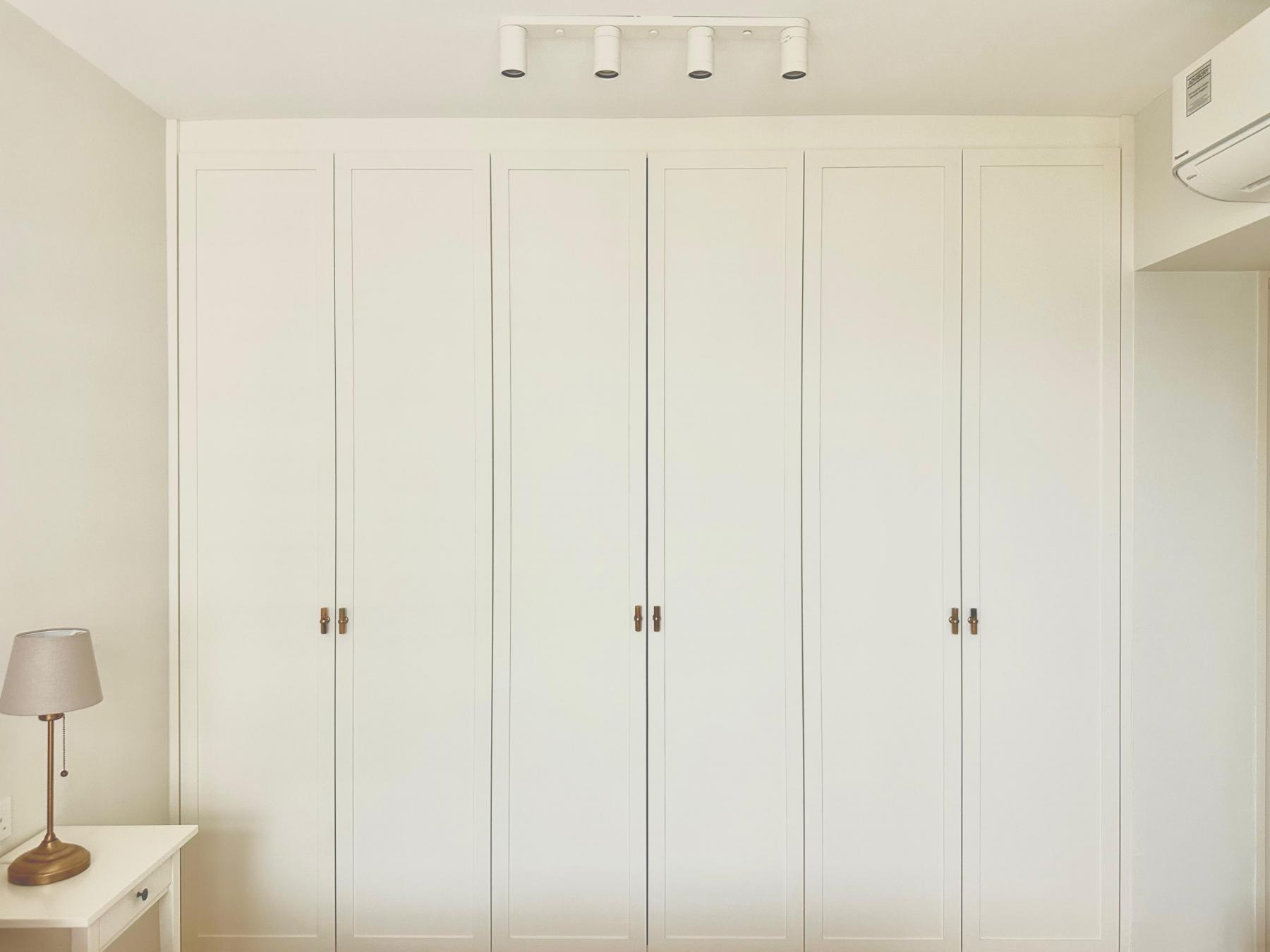 Minimalist Bedroom with Wardrobe and Bedside Table