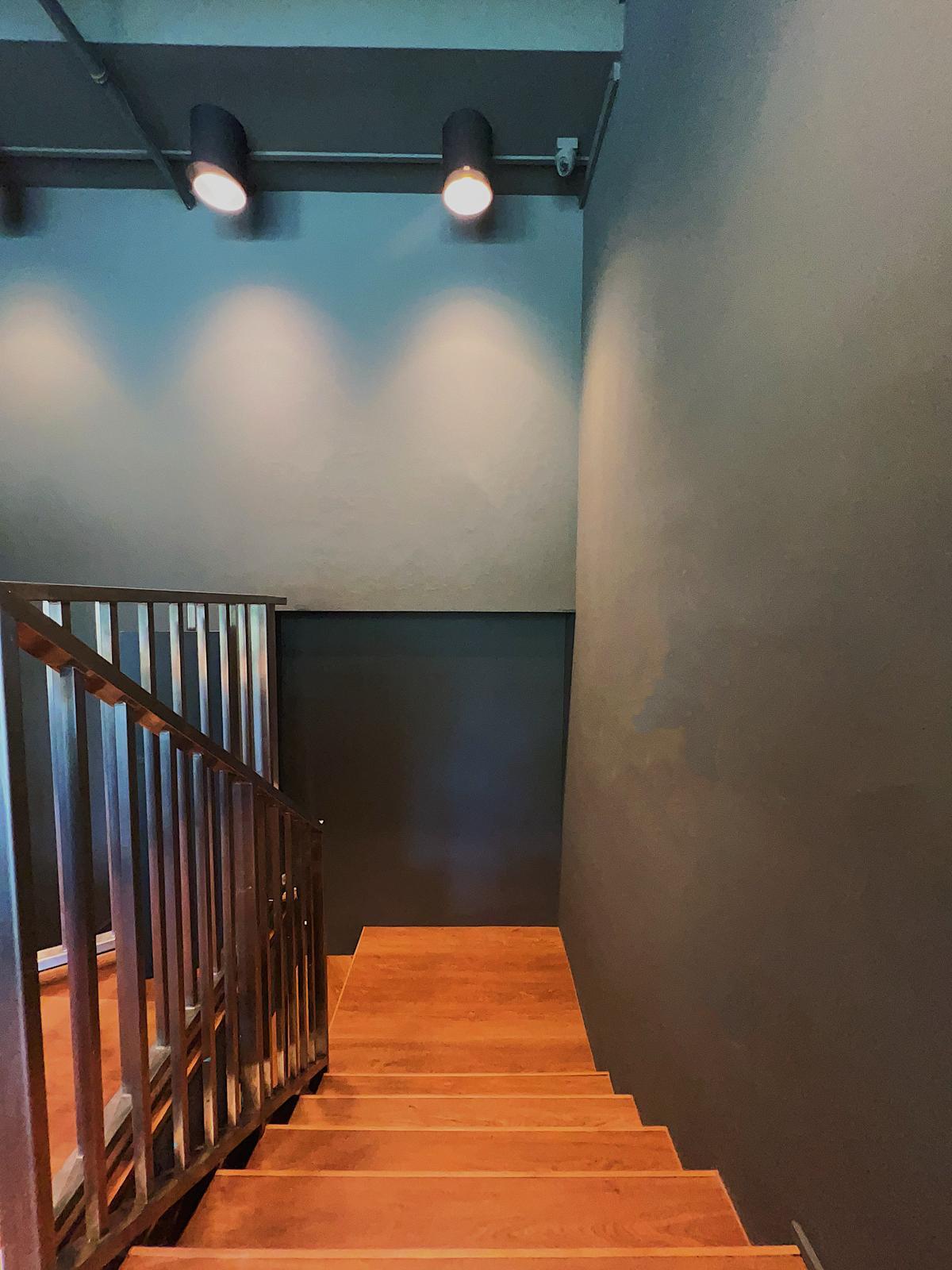 Industrial Entryway with Vinyl Flooring and Staircase
