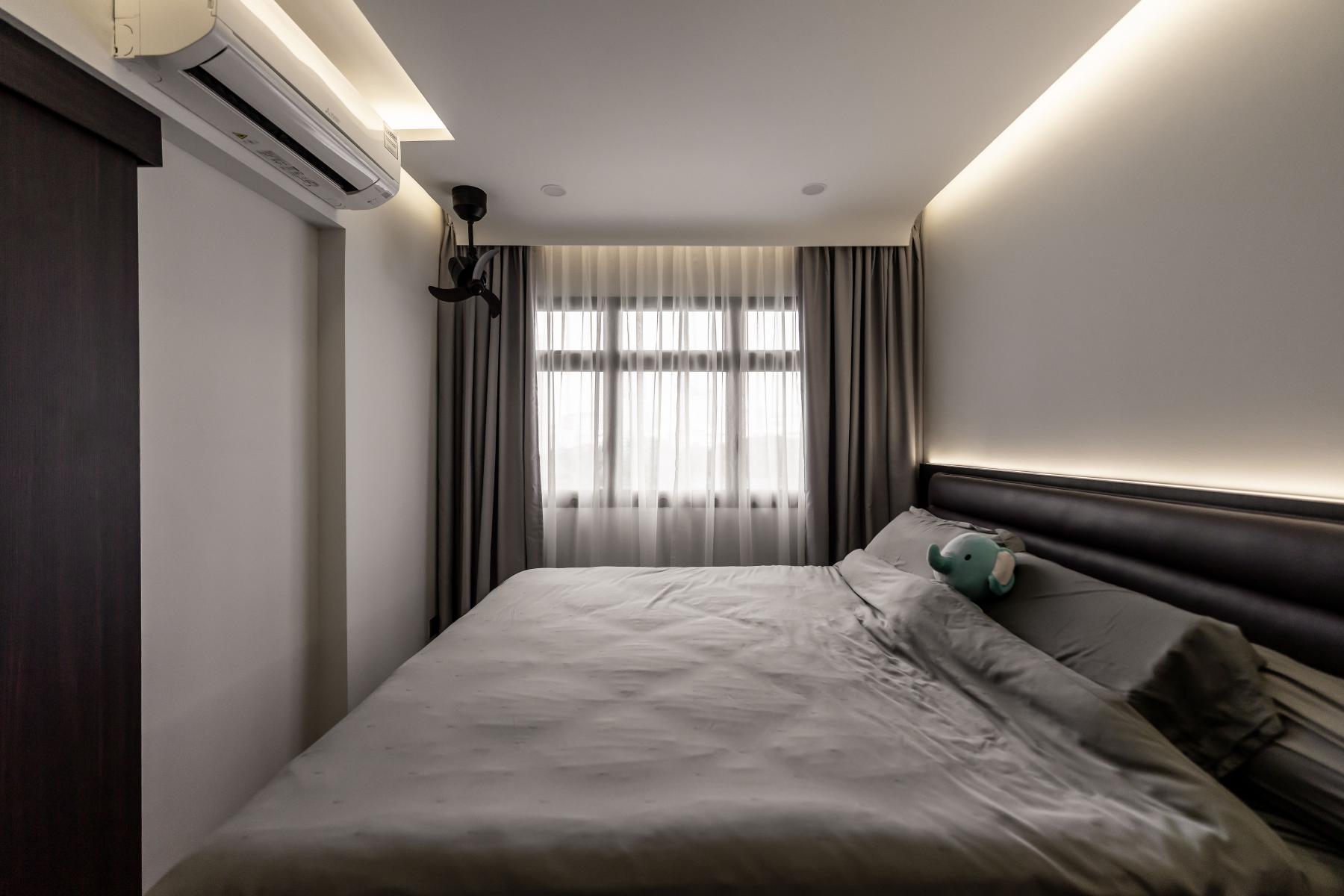 Contemporary Bedroom with Cove Lighting and Drop Ceiling
