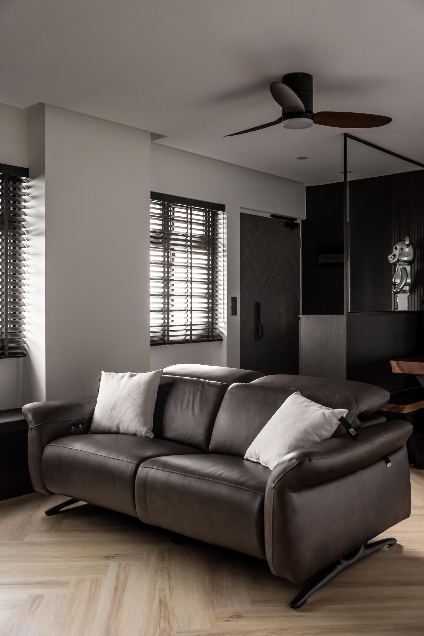 Contemporary Living Room with Herringbone Tiling and Wood Flooring