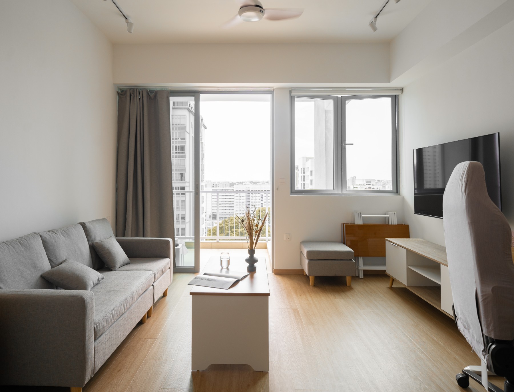 Contemporary Living Room with Wood Flooring and Artwork