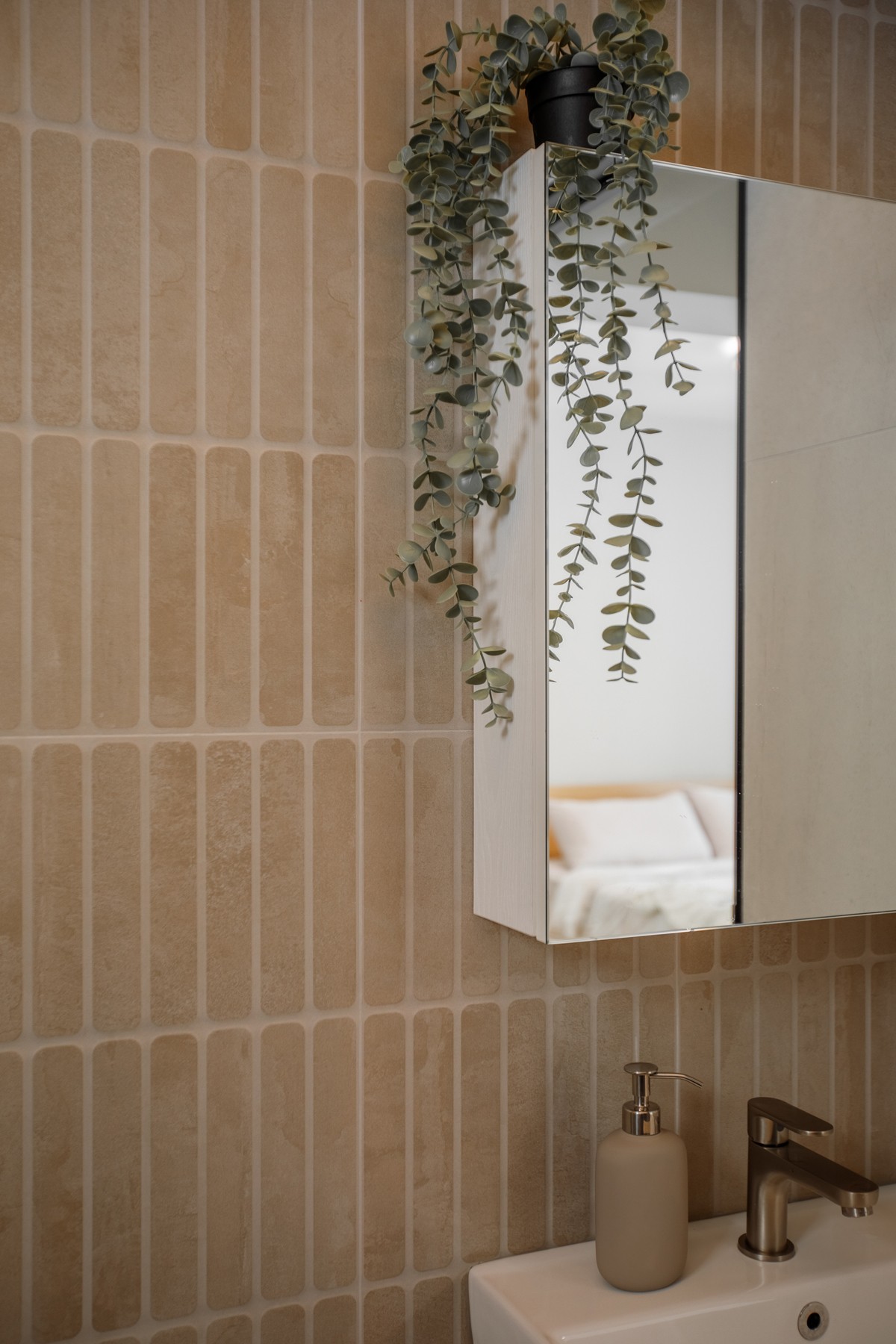Scandinavian Bathroom with Homogeneous Tiles and Mirror