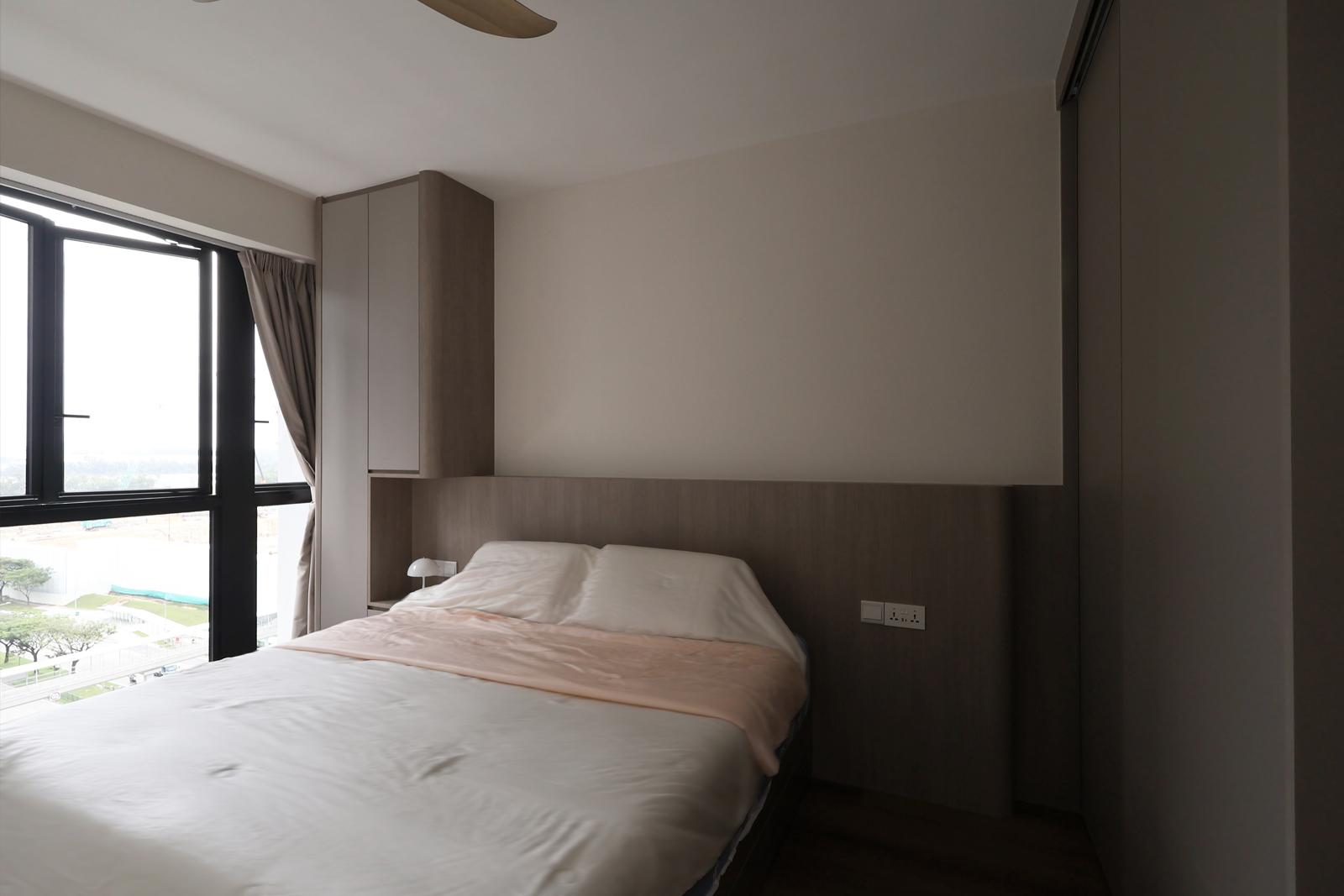 Contemporary Bedroom with Bay Window and Ceiling Light