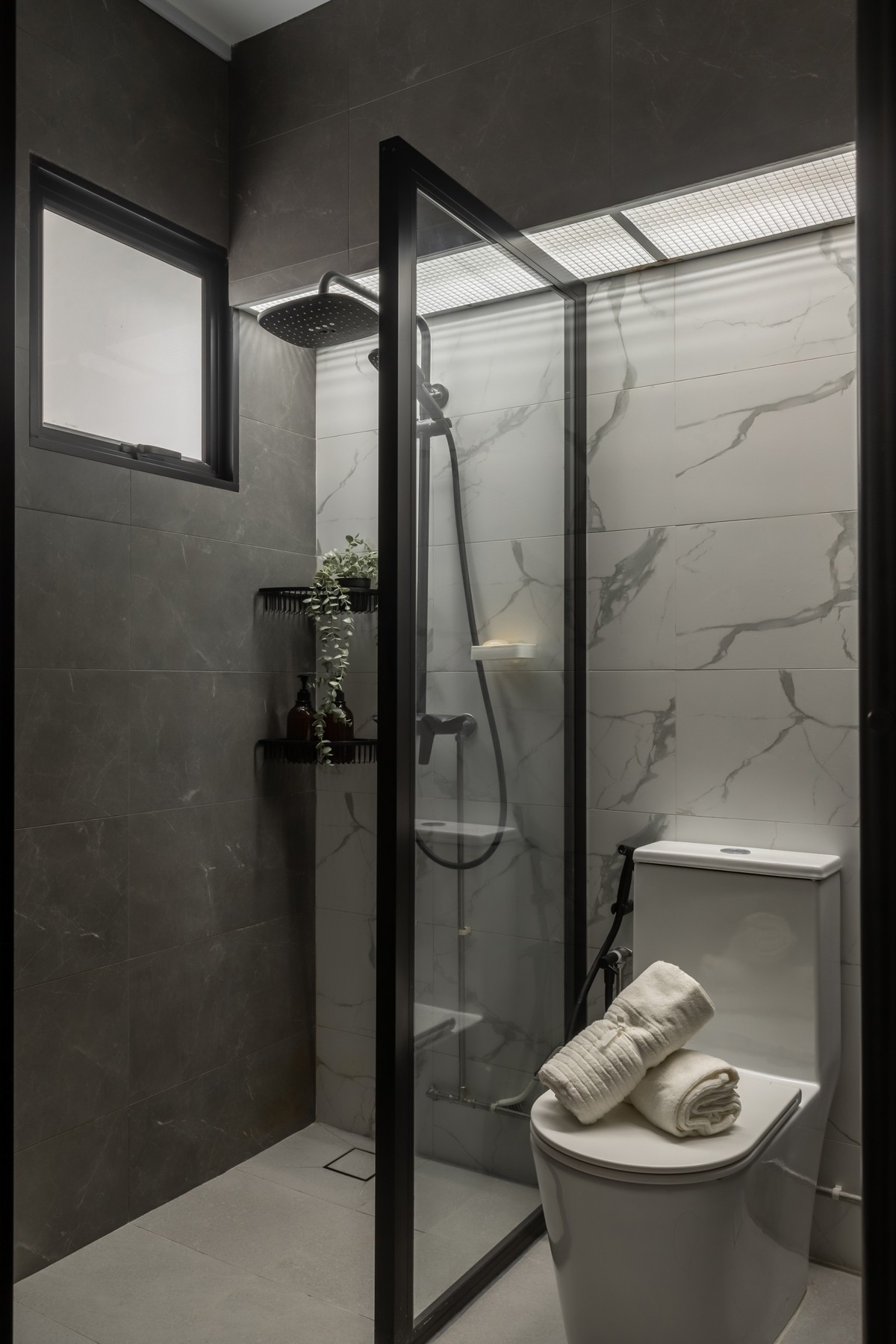 Minimalist Bathroom with Homogeneous Tiles and Bathroom Accessories