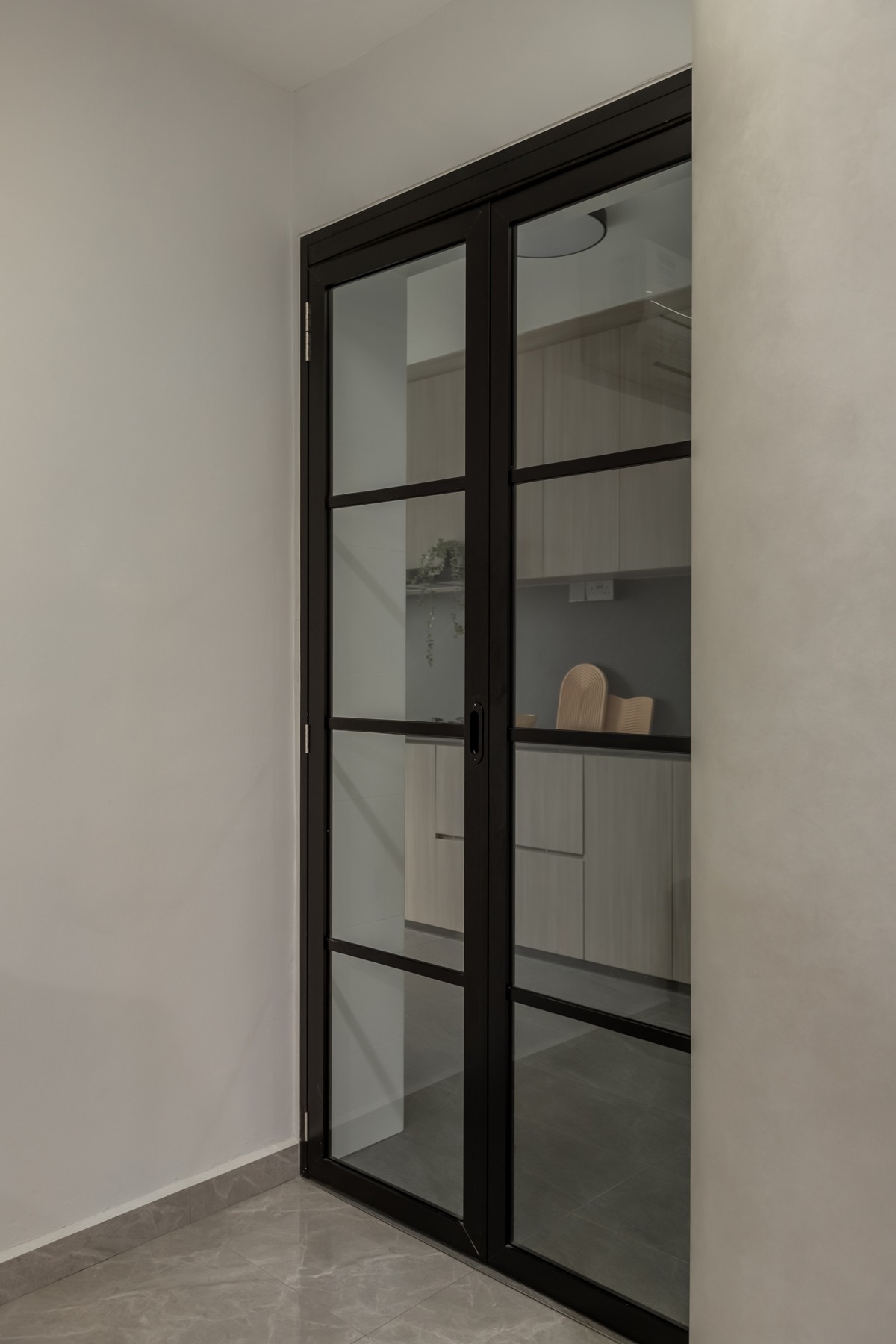 Minimalist Kitchen with Countertop and Glass Door