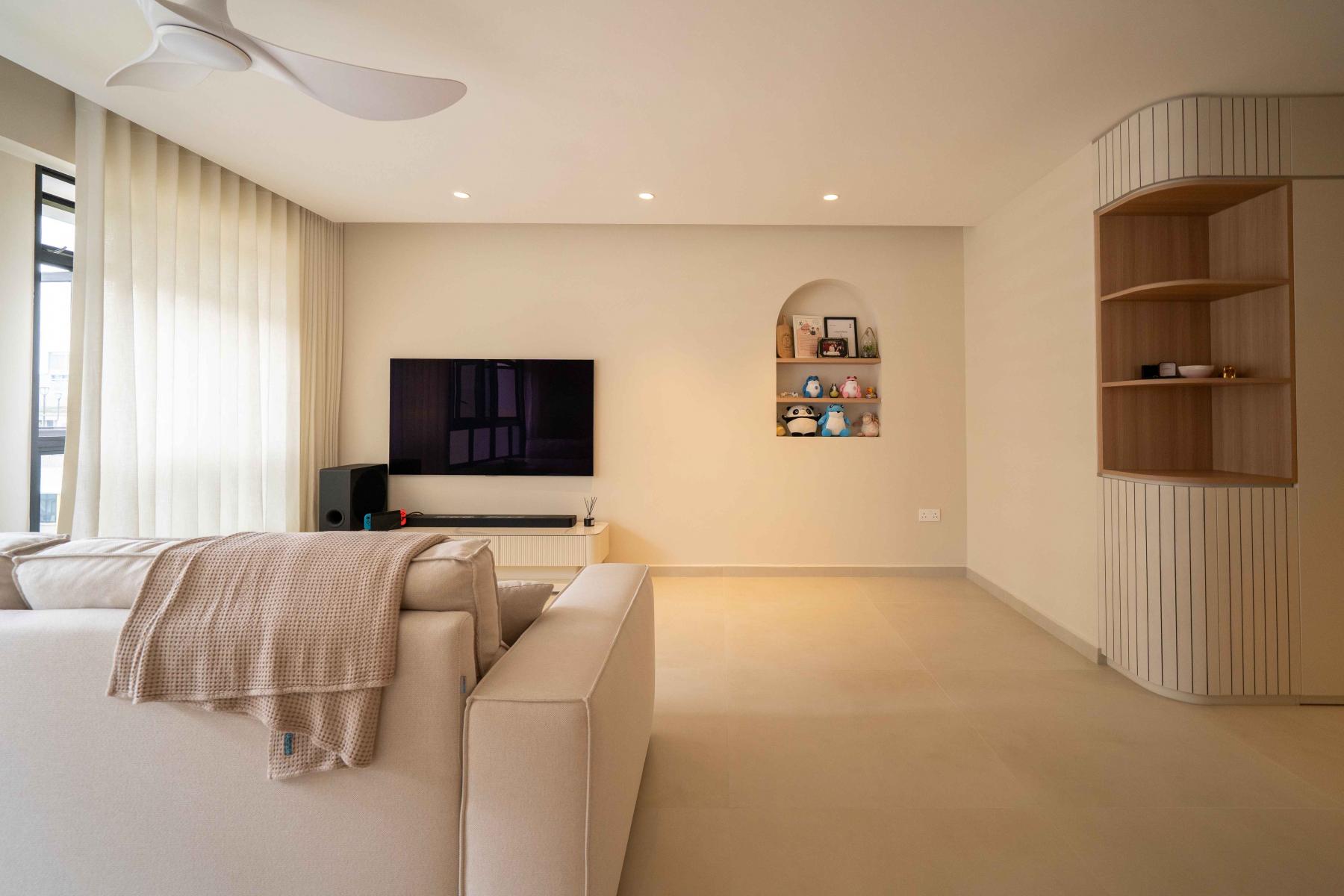 Minimalist Living Room with Cove Lighting and Display Cabinets
