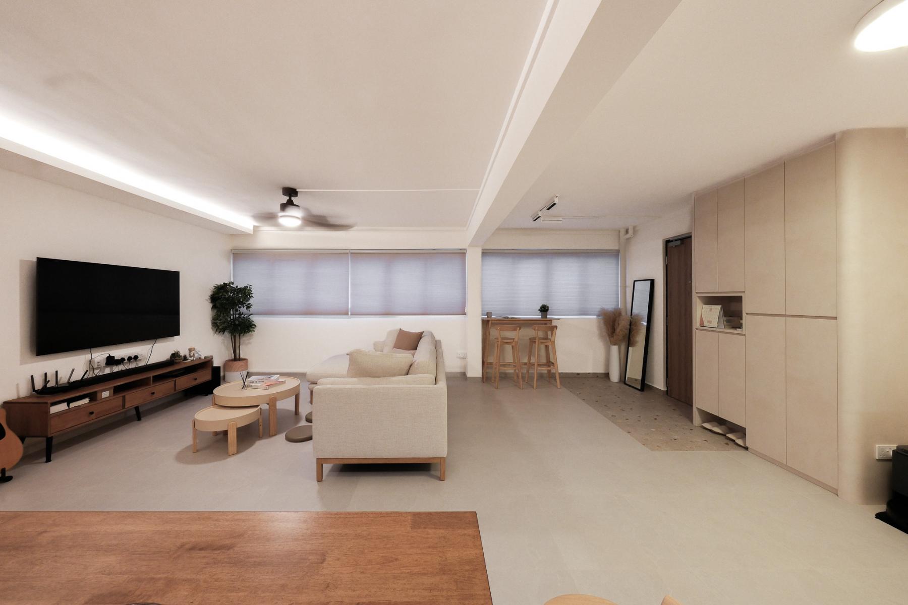 Scandinavian Living Room with Cement Floor and Feature Wall