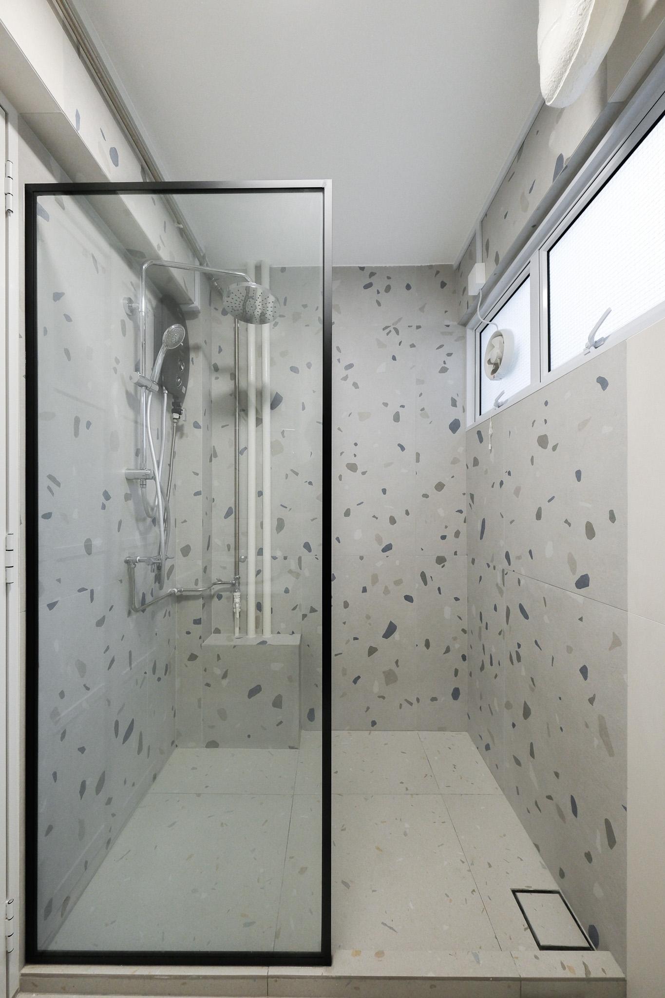 Scandinavian Bathroom with Granite Floor and Mirror