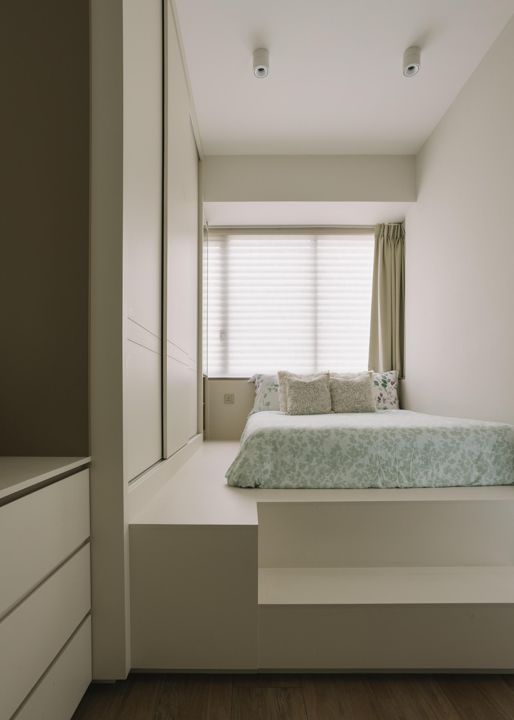 Scandinavian Bedroom with Platform Bed and Wood Flooring