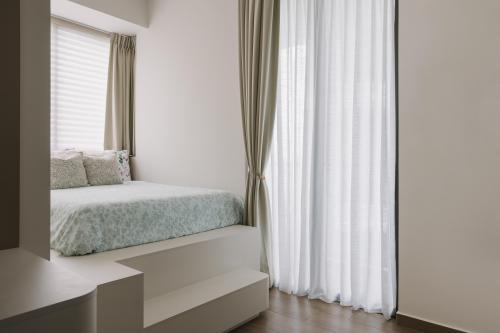 Scandinavian Bedroom at Skyline Residences II