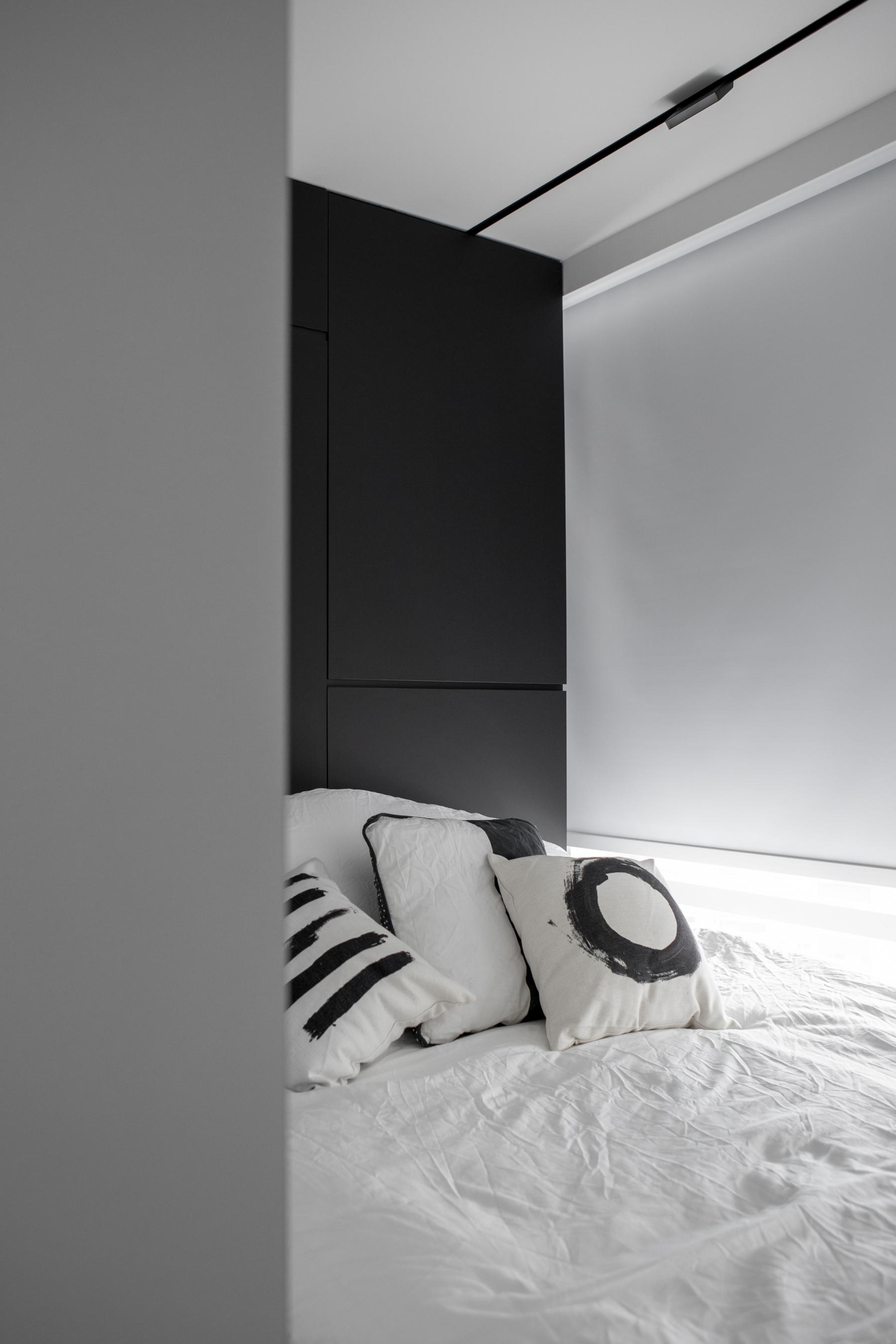Modern Bedroom with Cove Lighting and Drop Ceiling