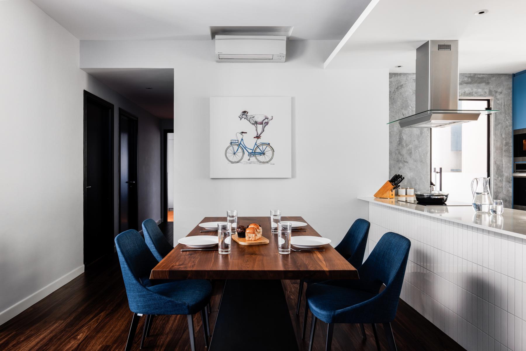 Scandinavian Dining Room with Countertop and Wood Flooring