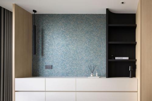 Minimalist Bedroom at Austville Residences