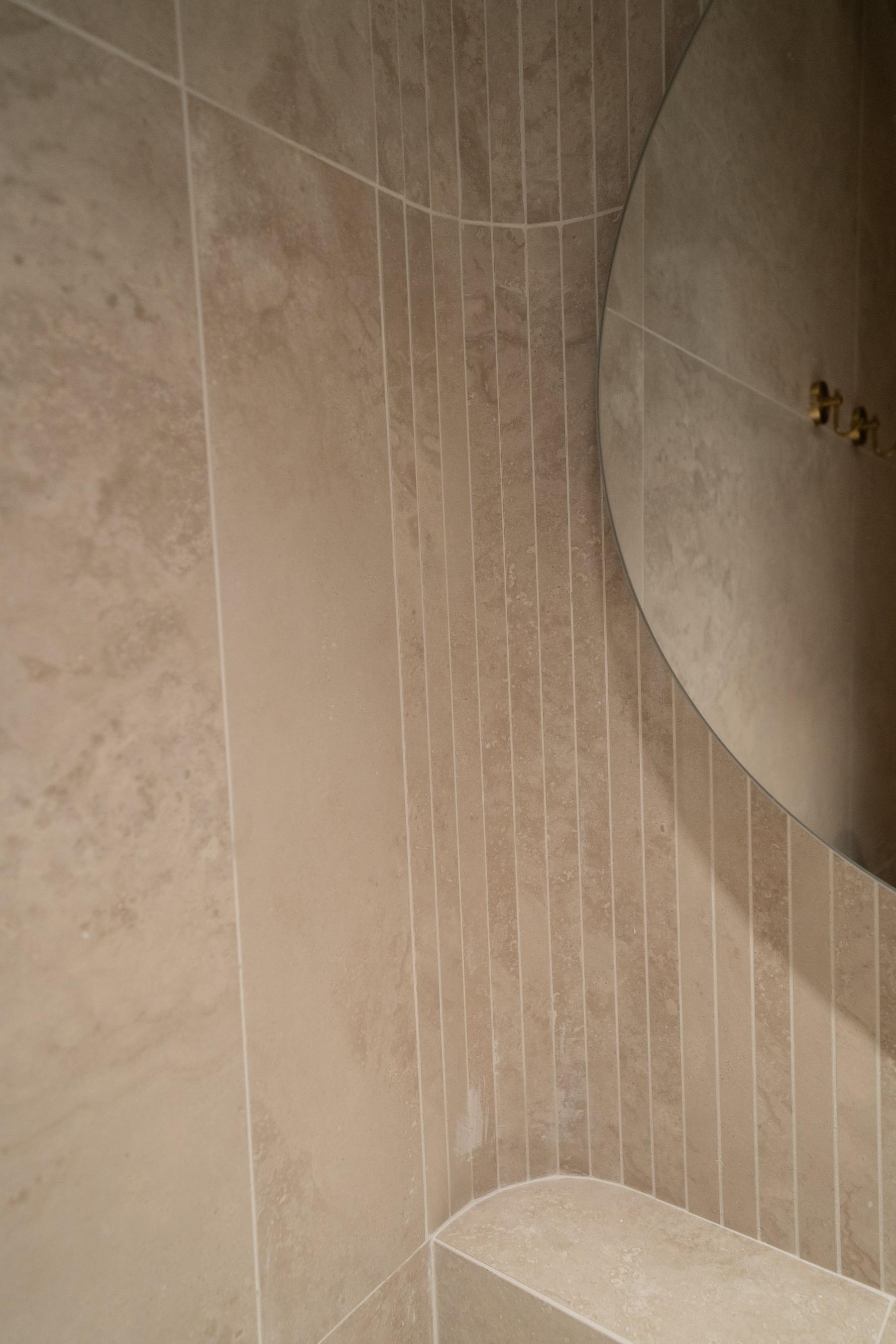 Minimalist Bathroom with Herringbone Tiling and Flooring