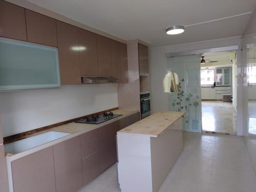 Modern Kitchen at 703 West Coast Road #11