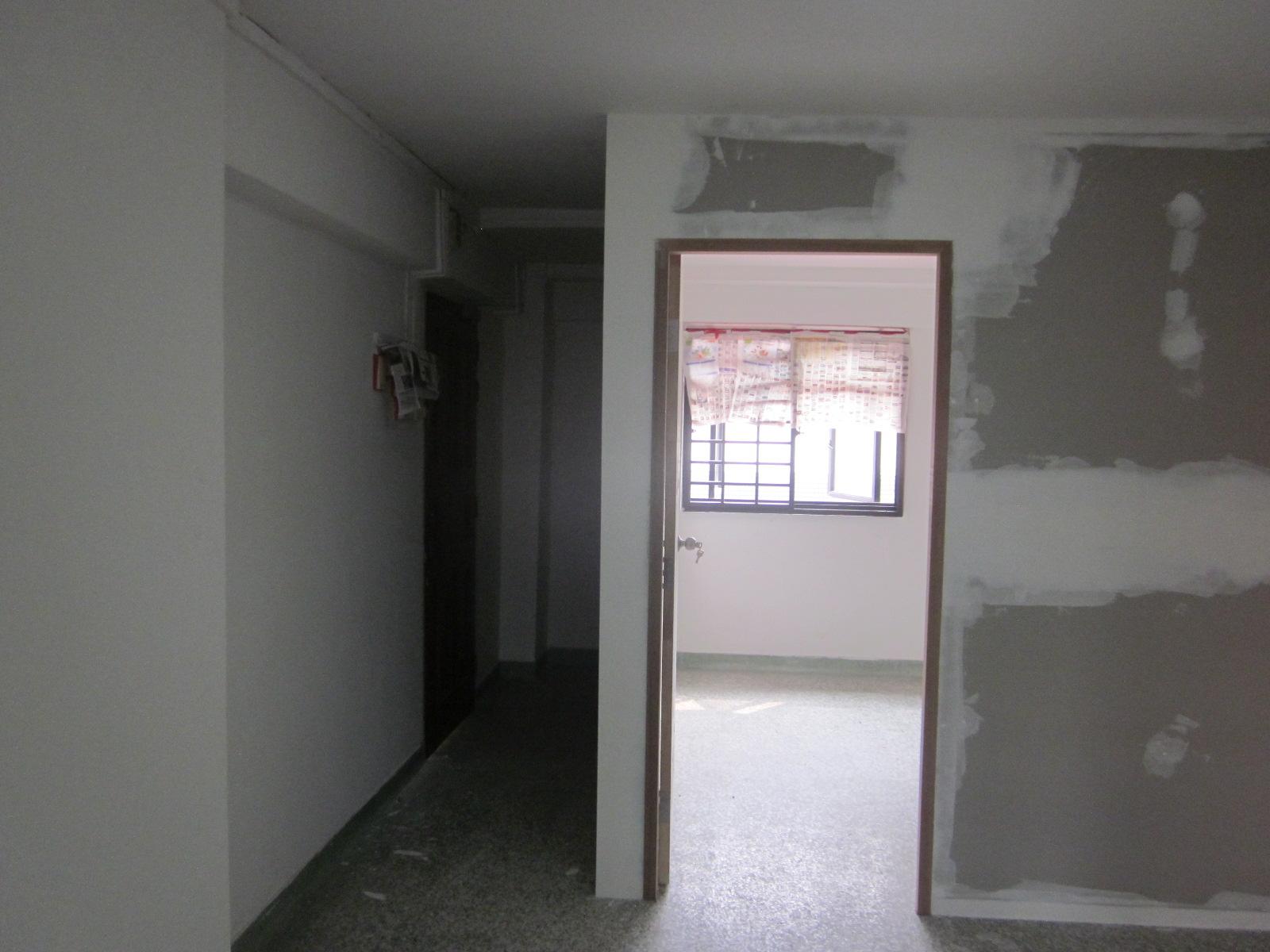 Asian Living Room with Bookshelf and TV Console