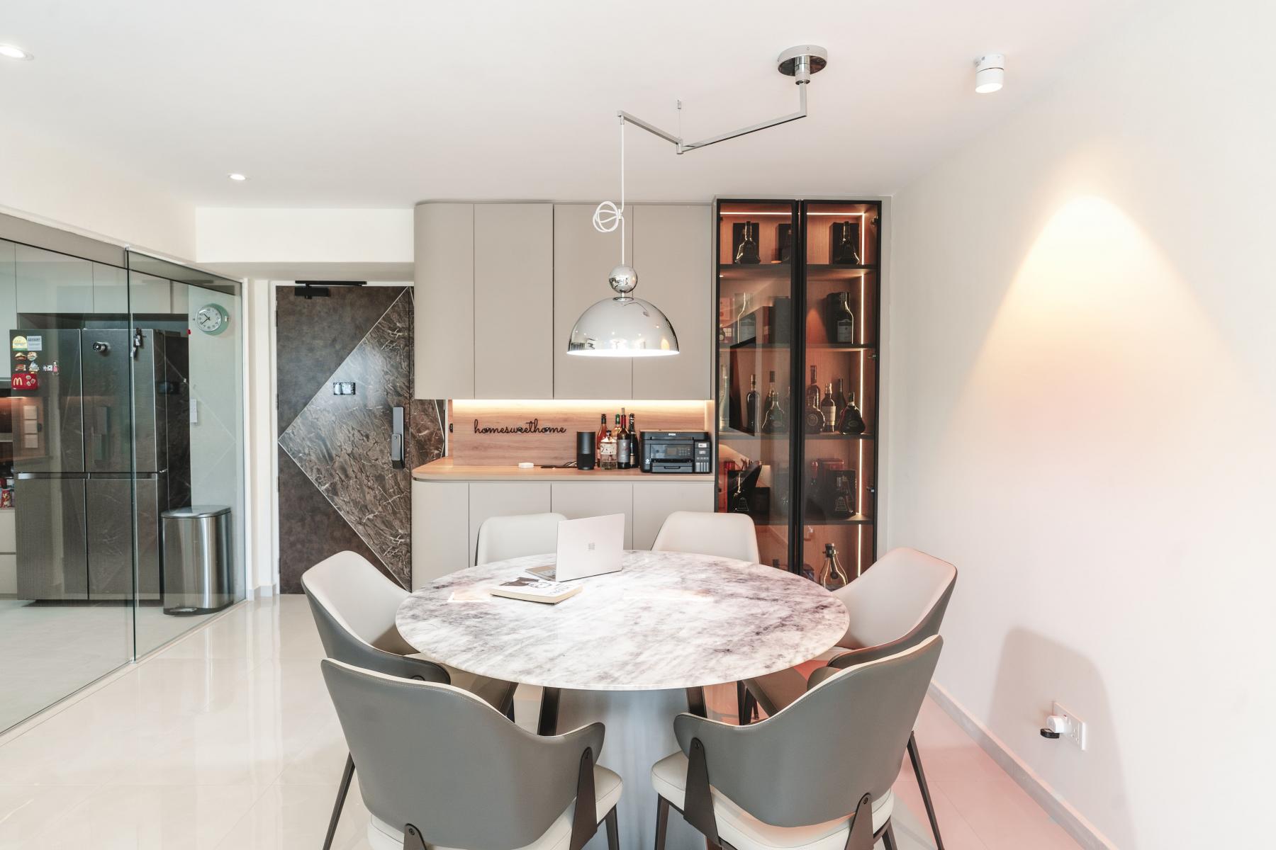 Contemporary Dining Room with Drop Light and Dining Table
