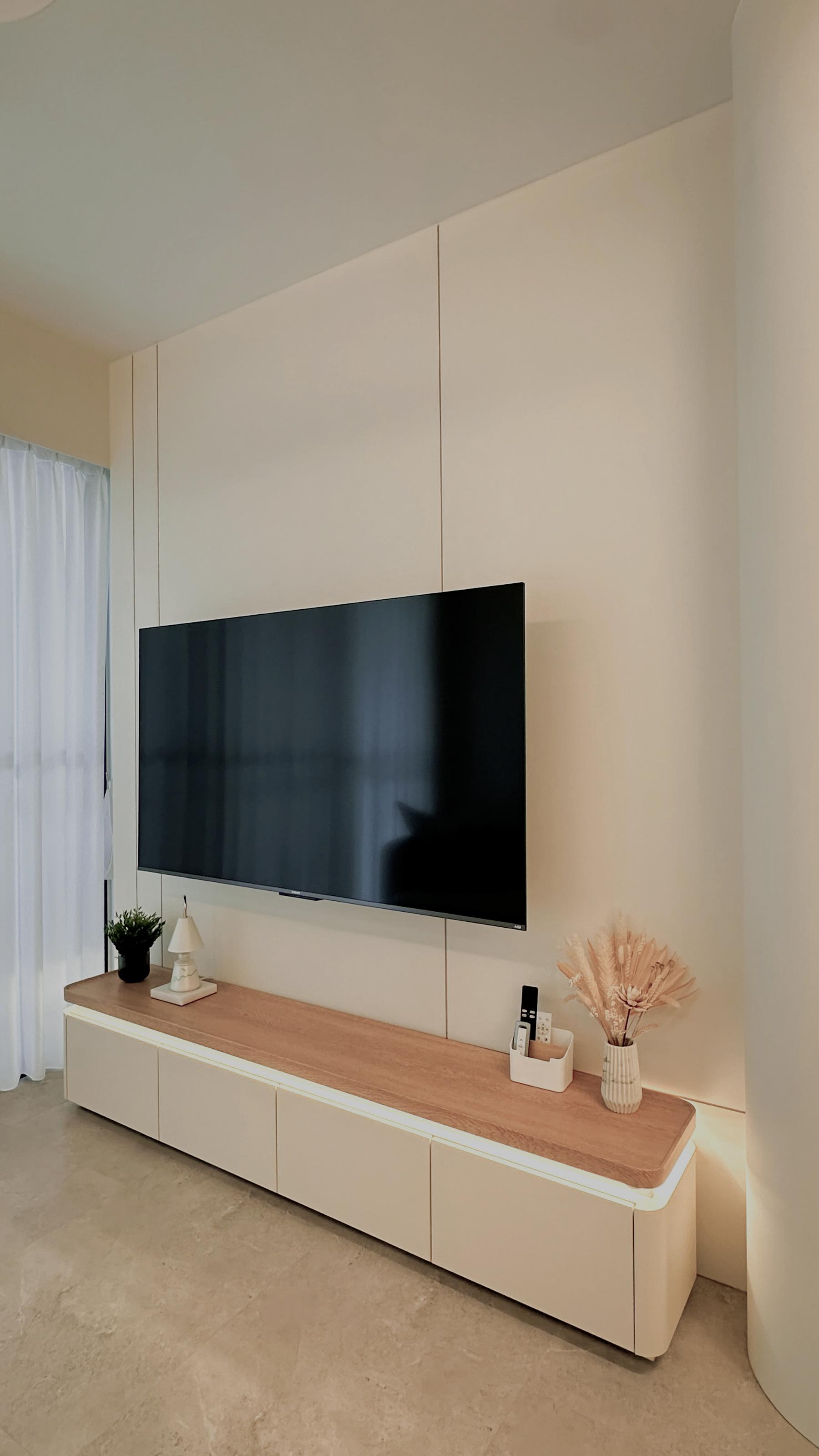 Minimalist Living Room with TV Console and Feature Wall