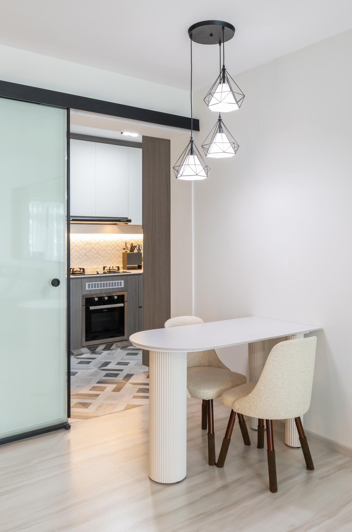 Modern Dining Room with Drop Light and Dining Table